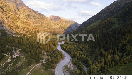 Beautiful sunset with a view of the green gorge 107124430