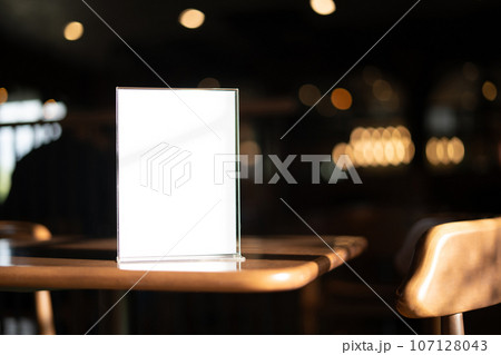 Stand Mock up Menu frame tent card blurred background design key visual layout. Stand Mock up Menu frame tent card blurred background design key visual layout. 107128043