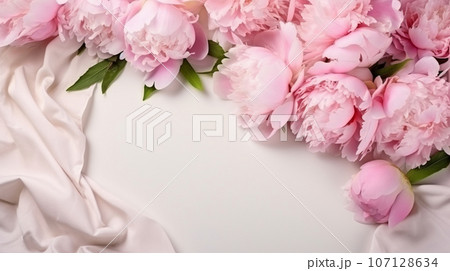 greeting card layout with pink peonies and silk ribbons. High quality photo greeting card layout with pink peonies and silk ribbons. High quality photo 107128634