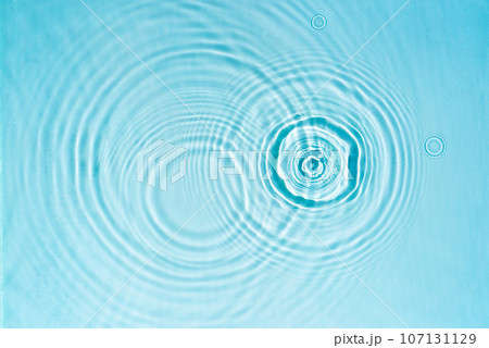 Blue transparent water texture with circles from drops Blue transparent water texture with circles from drops 107131129