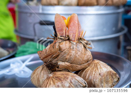 Zongzi or Ba Jang, product samples placed in stainless steel plates for customers to see. 107135596
