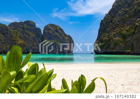The legendary Maya Bay beach without people where the film "beach" with Leonardo DiCaprio was filmed with a beautiful bay of sand and clear turquoise water. UNESCO World Heritage. 107140382