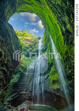 Beautiful waterfalls in sunny day,Bottom view Madakaripura Waterfall is the tallest waterfall in East Java, Indonesia Beautiful waterfalls in sunny day,Bottom view Madakaripura Waterfall is the tallest waterfall in East Java, Indonesia 107142208