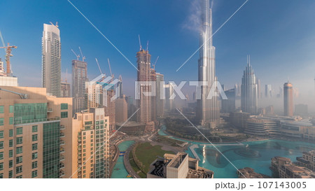 Aerial view of Dubai city early morning during fog. 107143005