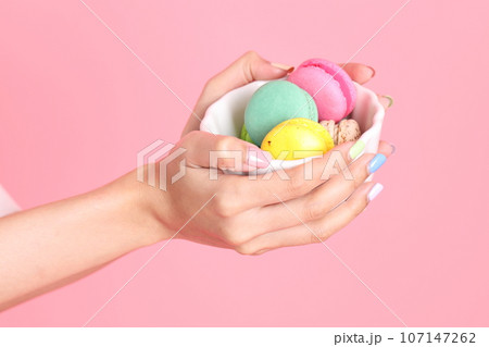 Hand with Macaroons 107147262