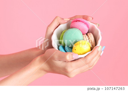 Hand with Macaroons 107147263