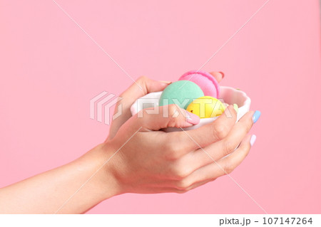 Hand with Macaroons 107147264