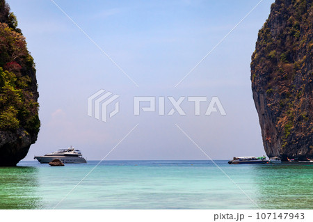 The legendary Maya Bay beach without people where the film "beach" with Leonardo DiCaprio was filmed with a beautiful bay of sand and clear turquoise water. UNESCO World Heritage. 107147943