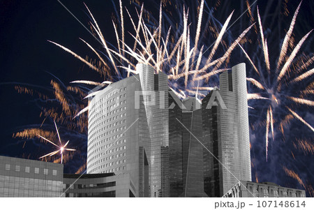 Celebratory fireworks over the Skyscrapers La Defense, commercial and business center of Paris, France Celebratory fireworks over the Skyscrapers La Defense, commercial and business center of Paris, France 107148614