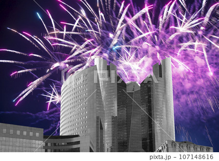 Celebratory fireworks over the Skyscrapers La Defense, commercial and business center of Paris, France Celebratory fireworks over the Skyscrapers La Defense, commercial and business center of Paris, France 107148616