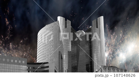 Celebratory fireworks over the Skyscrapers La Defense, commercial and business center of Paris, France Celebratory fireworks over the Skyscrapers La Defense, commercial and business center of Paris, France 107148626