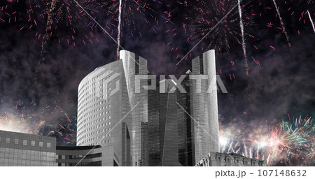 Celebratory fireworks over the Skyscrapers La Defense, commercial and business center of Paris, France Celebratory fireworks over the Skyscrapers La Defense, commercial and business center of Paris, France 107148632