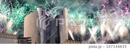 Celebratory fireworks over the Skyscrapers La Defense, commercial and business center of Paris, France Celebratory fireworks over the Skyscrapers La Defense, commercial and business center of Paris, France 107148635