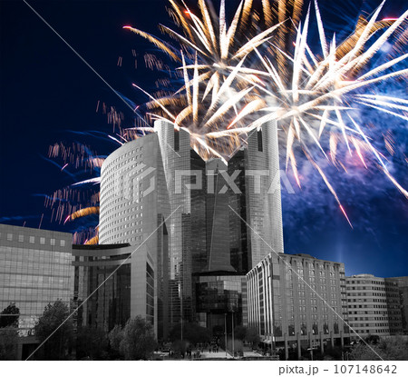 Celebratory fireworks over the Skyscrapers La Defense, commercial and business center of Paris, France Celebratory fireworks over the Skyscrapers La Defense, commercial and business center of Paris, France 107148642