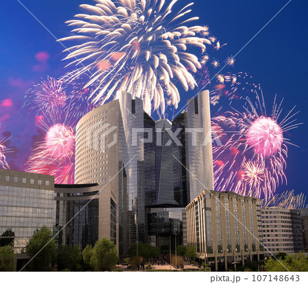 Celebratory fireworks over the Skyscrapers La Defense, commercial and business center of Paris, France Celebratory fireworks over the Skyscrapers La Defense, commercial and business center of Paris, France 107148643