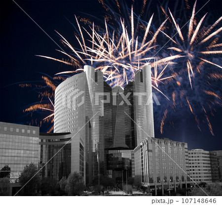 Celebratory fireworks over the Skyscrapers La Defense, commercial and business center of Paris, France 107148646