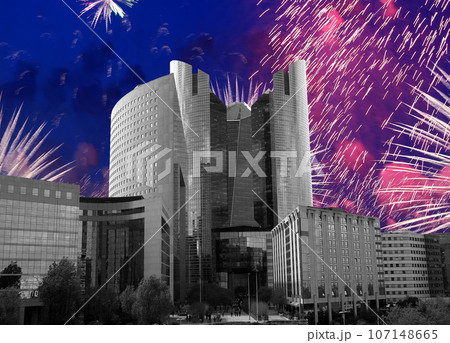 Celebratory fireworks over the Skyscrapers La Defense, commercial and business center of Paris, France 107148665