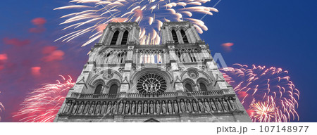 Celebratory fireworks over the Notre Dame de Paris, also known as Notre Dame Cathedral or simply Notre Dame, is a Gothic, Roman Catholic cathedral of Paris, France Celebratory fireworks over the Notre Dame de Paris, also known as Notre Dame Cathedral or simply Notre Dame, is a Gothic, Roman Catholic cathedral of Paris, France 107148977
