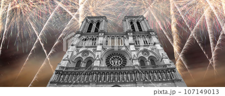 Celebratory fireworks over the Notre Dame de Paris, also known as Notre Dame Cathedral or simply Notre Dame, is a Gothic, Roman Catholic cathedral of Paris, France Celebratory fireworks over the Notre Dame de Paris, also known as Notre Dame Cathedral or simply Notre Dame, is a Gothic, Roman Catholic cathedral of Paris, France 107149013