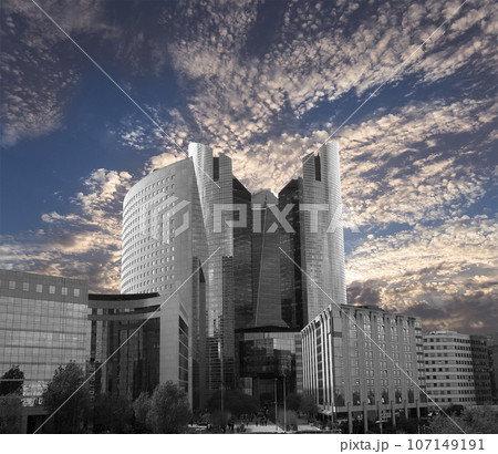 Skyscrapers La Defense (against the background of a sky at sunset), commercial and business center of Paris, France 107149191