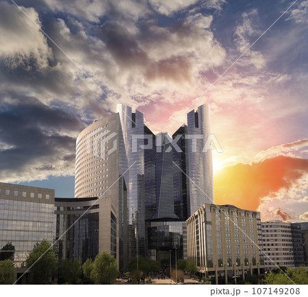 Skyscrapers La Defense (against the background of a sky at sunset), commercial and business center of Paris, France 107149208