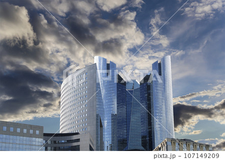 Skyscrapers La Defense (against the background of a sky at sunset), commercial and business center of Paris, France 107149209