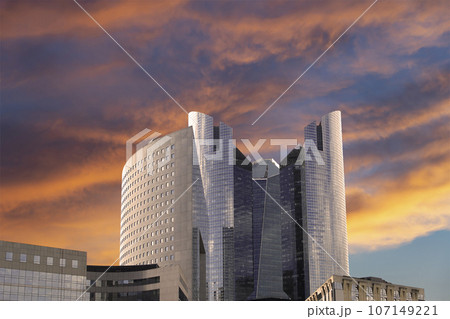 Skyscrapers La Defense (against the background of a sky at sunset), commercial and business center of Paris, France Skyscrapers La Defense (against the background of a sky at sunset), commercial and business center of Paris, France 107149221