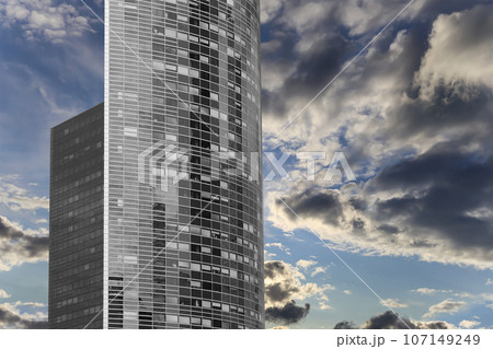 Skyscrapers La Defense (against the background of a sky at sunset), commercial and business center of Paris, France 107149249