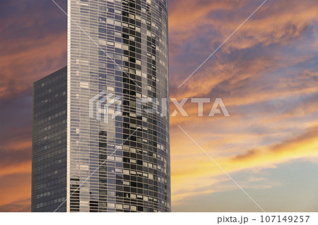 Skyscrapers La Defense (against the background of a sky at sunset), commercial and business center of Paris, France 107149257
