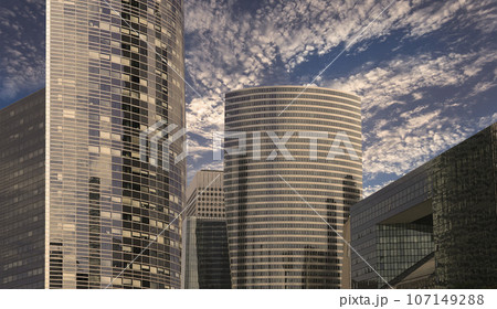 Skyscrapers La Defense (against the background of a sky at sunset), commercial and business center of Paris, France 107149288