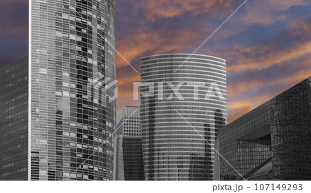 Skyscrapers La Defense (against the background of a sky at sunset), commercial and business center of Paris, France 107149293