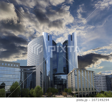 Skyscrapers La Defense (against the background of a sky at sunset), commercial and business center of Paris, France 107149294