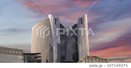Skyscrapers La Defense (against the background of a sky at sunset), commercial and business center of Paris, France Skyscrapers La Defense (against the background of a sky at sunset), commercial and business center of Paris, France 107149373