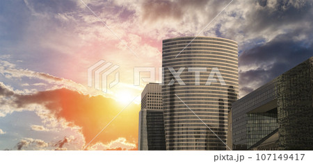 Skyscrapers La Defense (against the background of a sky at sunset), commercial and business center of Paris, France Skyscrapers La Defense (against the background of a sky at sunset), commercial and business center of Paris, France 107149417