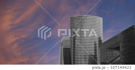Skyscrapers La Defense (against the background of a sky at sunset), commercial and business center of Paris, France Skyscrapers La Defense (against the background of a sky at sunset), commercial and business center of Paris, France 107149422