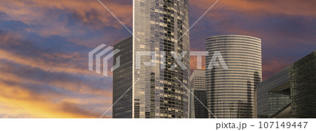 Skyscrapers La Defense (against the background of a sky at sunset), commercial and business center of Paris, France 107149447