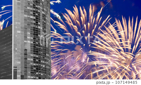 Celebratory fireworks over the Skyscrapers La Defense, commercial and business center of Paris, France Celebratory fireworks over the Skyscrapers La Defense, commercial and business center of Paris, France 107149485