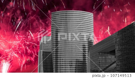 Celebratory fireworks over the Skyscrapers La Defense, commercial and business center of Paris, France Celebratory fireworks over the Skyscrapers La Defense, commercial and business center of Paris, France 107149513