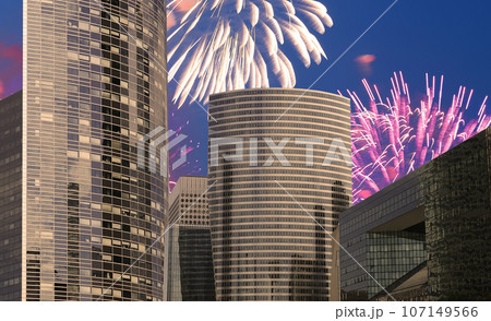 Celebratory fireworks over the Skyscrapers La Defense, commercial and business center of Paris, France 107149566