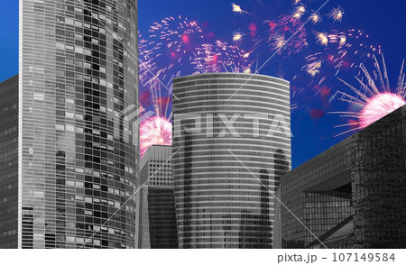 Celebratory fireworks over the Skyscrapers La Defense, commercial and business center of Paris, France Celebratory fireworks over the Skyscrapers La Defense, commercial and business center of Paris, France 107149584