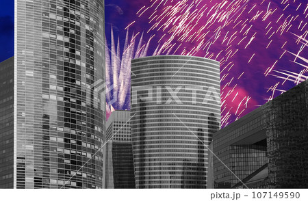 Celebratory fireworks over the Skyscrapers La Defense, commercial and business center of Paris, France 107149590