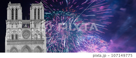 Celebratory fireworks over the Notre Dame de Paris, also known as Notre Dame Cathedral or simply Notre Dame, is a Gothic, Roman Catholic cathedral of Paris, France Celebratory fireworks over the Notre Dame de Paris, also known as Notre Dame Cathedral or simply Notre Dame, is a Gothic, Roman Catholic cathedral of Paris, France 107149775