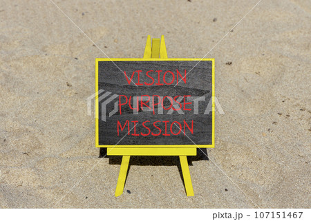 Vision purpose mission symbol. Concept word Vision Purpose Mission on beautiful black blackboard. Beautiful sand beach background. Business motivational vision purpose mission concept. Copy space. 107151467