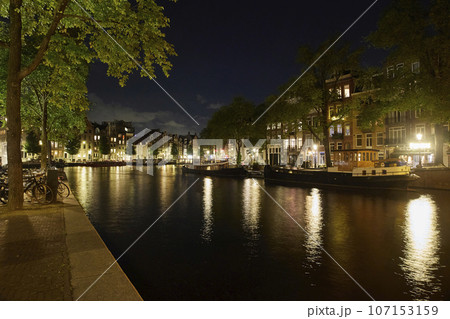 Majestic Amsterdam at night. Summer city landscape. Panorama Majestic Amsterdam at night. Summer city landscape. Panorama 107153159