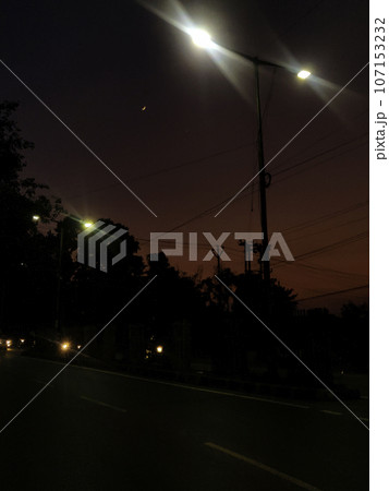 Streetlight Silhouette at Night in the Streets of Morabadi, Ranchi, Jharkhand, India 107153232
