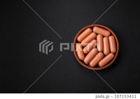 Delicious fresh vegetarian sausage or sausage made from vegetable protein tofu or seitan Delicious fresh vegetarian sausage or sausage made from vegetable protein tofu or seitan 107153411