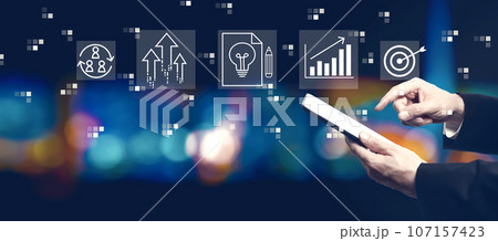 Idea of success theme with businessman using a tablet computer 107157423