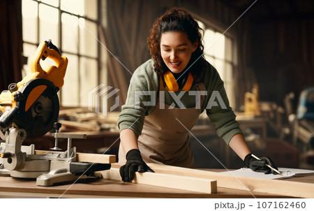 carpenter is working in workshop carpenter is working in workshop 107162460
