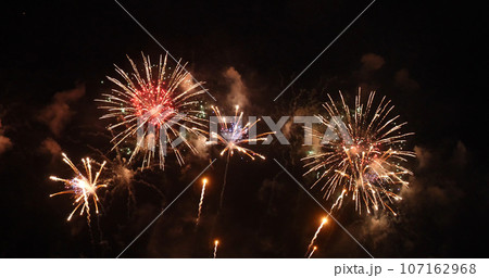 Golden Firework celebrate anniversary independence day night time celebrate national holiday. Countdown to new year 2024 party time event. Happy new year 2024, 4th of july holiday festival concept Golden Firework celebrate anniversary independence day night time celebrate national holiday. Countdown to new year 2024 party time event. Happy new year 2024, 4th of july holiday festival concept 107162968
