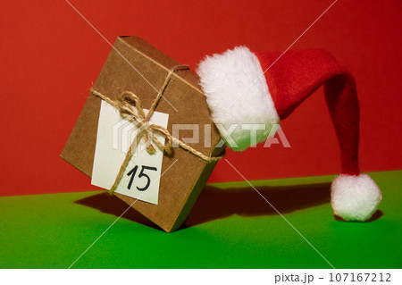 Original Advent Calendar for Christmas Homemade present gift. Preparation to Christmas concept. Family winter holidays. Eco friendly presents gifts. open the package every day Original Advent Calendar for Christmas Homemade present gift. Preparation to Christmas concept. Family winter holidays. Eco friendly presents gifts. open the package every day 107167212